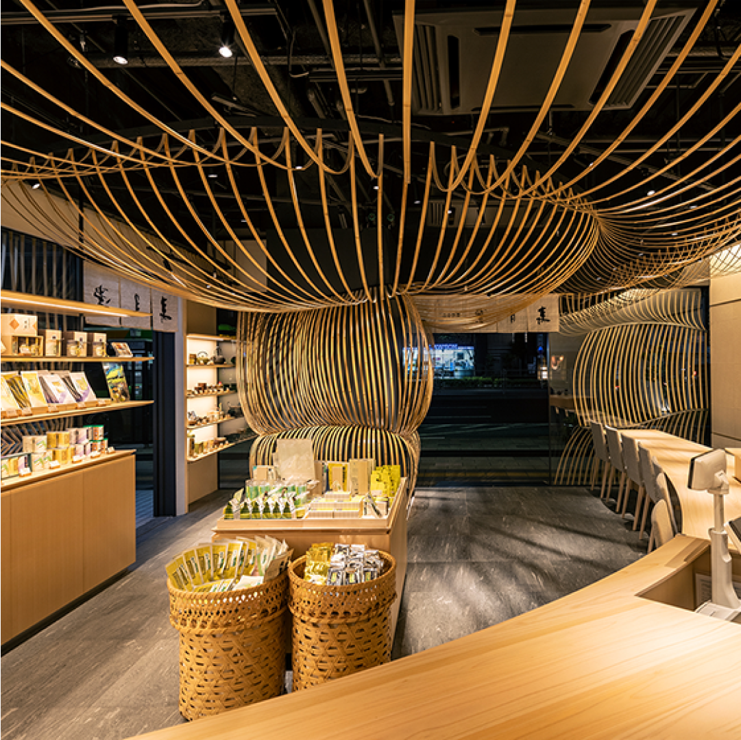 Where to Buy Best Matcha in Tokyo: 7 Excellent Tea Shops (2026) 11 Jugetsudo Japanese tea shop in Tsukiji with curved bamboo architecture and displays of premium matcha and tea accessories